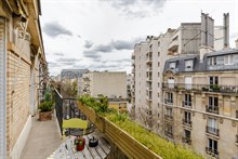 Business stays in short term flat rental w balcony near metro Charles Michel in Paris 15th