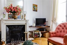 Luxury monthly apartment rental w decorative fireplace for 6 near Moulin Rouge apartment on rue Marcadet, Paris 18th