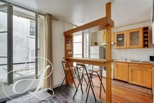 Lease of a large furnished studio in mid short terms rent "Jean Mermoz" street Paris