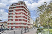 Seasonal furnished rental large studio alcove for two with balcony + view around corner from metro in Vanves