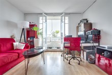 Seasonal furnished rental large studio alcove for two with balcony + view around corner from metro in Vanves