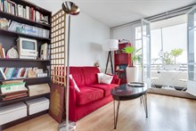 Seasonal furnished rental large studio alcove for two with balcony + view around corner from metro in Vanves