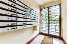 Seasonal furnished rental large studio alcove for two with balcony + view around corner from metro in Vanves