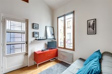 Monthly furnished rental one bedroom for two in front of the Buttes Chaumont Paris nineteenth district 19th arrondissement