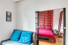 Monthly furnished rental one bedroom for two in front of the Buttes Chaumont Paris nineteenth district 19th arrondissement