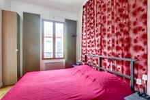 Monthly furnished rental one bedroom for two in front of the Buttes Chaumont Paris nineteenth district 19th arrondissement