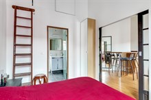 Monthly furnished rental one bedroom for two in front of the Buttes Chaumont Paris nineteenth district 19th arrondissement