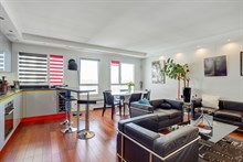 Furnished monthly rental modern one bedroom with panoramic view of Paris in tolbiac place d`Italie Paris thirteenth district / 13th arrondissement