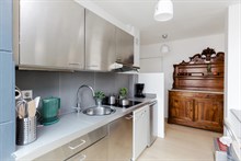 Location meublée mensuelle d'un appartement de 2 pièces moderne pour 2 personnes avec véranda et vue panoramique aux Gobelins Paris 13ème