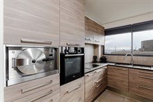 Location meublée temporaire d'un appartement de 2 pièces design pour 2 avec vue panoramique en face de la Seine à Javel Paris 15ème