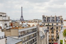 Location au mois d'un appartement de 3 pièces avec 2 chambres et vue Tour Eiffel à Montparnasse Paris 15ème