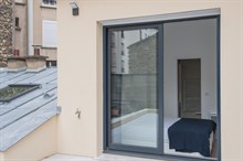 Location meublée de standing d'un appartement de 3 pièces moderne avec 2 chambres et grande terrasse à Charles Michels Paris 15ème