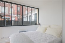 Location de standing d'un appartement moderne refait à neuf avec 2 chambres doubles et terrasse rue Saint Charles Paris à Beaugrenelle 15ème