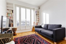 Appartamento per 2 persone su 32m2 e situato al 6° piano di un edificio con ascensore, nel quartiere Exelmans, 16° distretto di Parigi.
